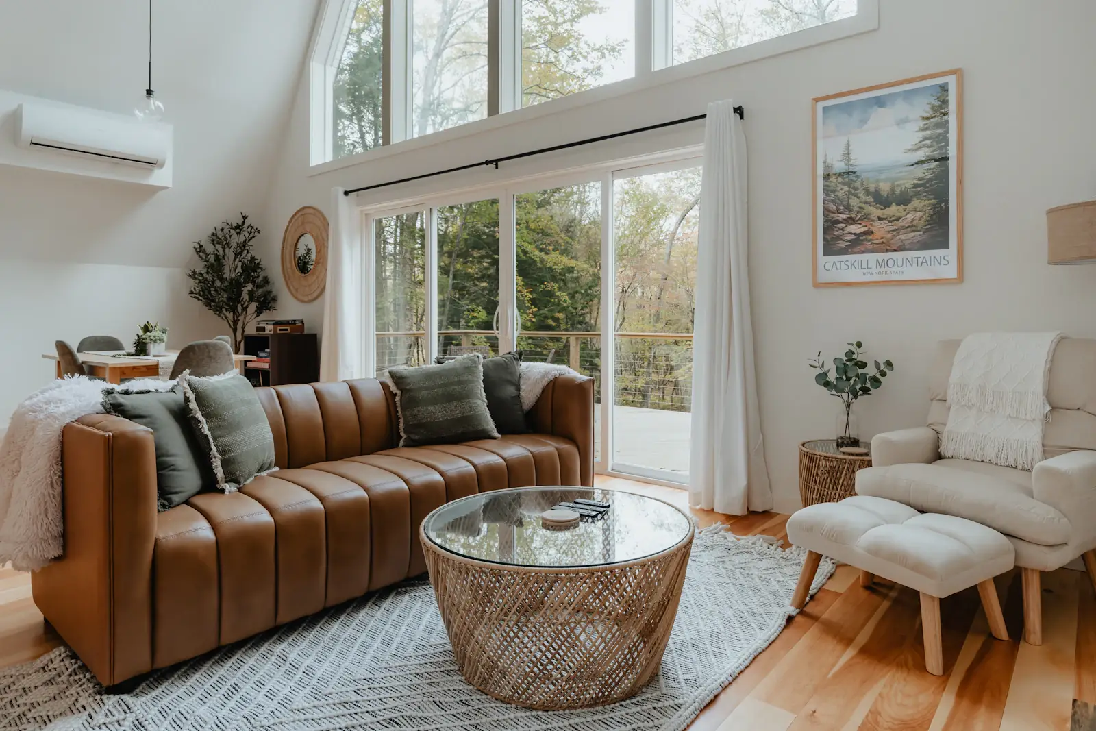 A cognac leather sofa in a bright living room