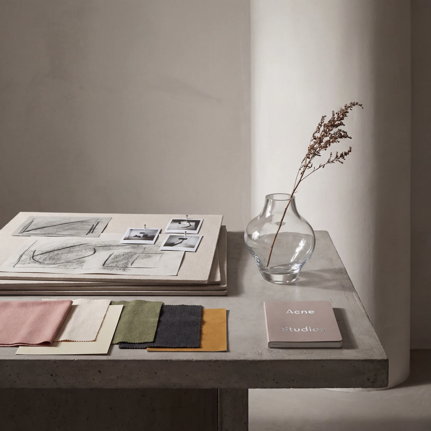 Baylee’s worktable with drawings and fabric samples