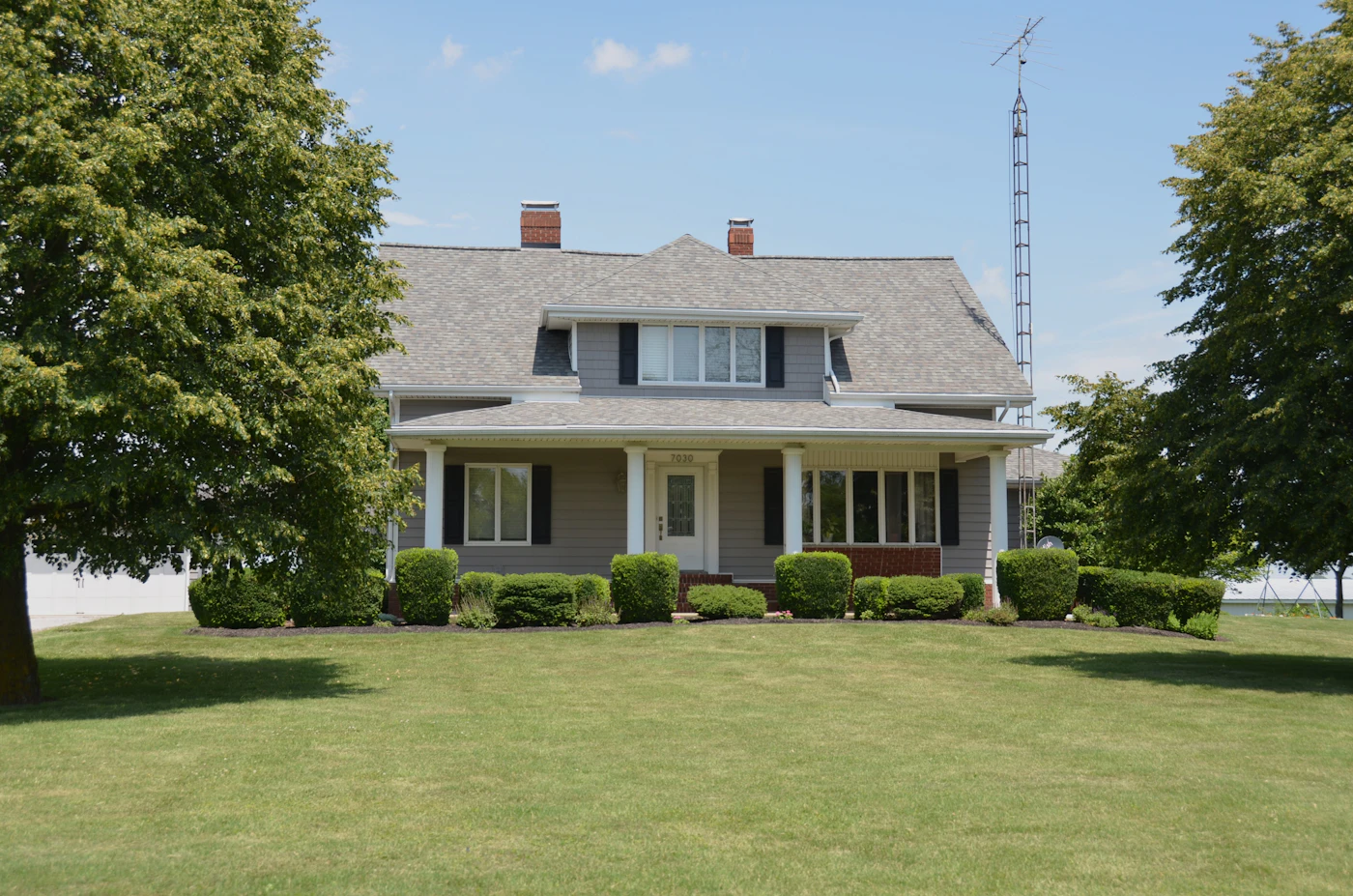 A Texas family home with a deep green lawn